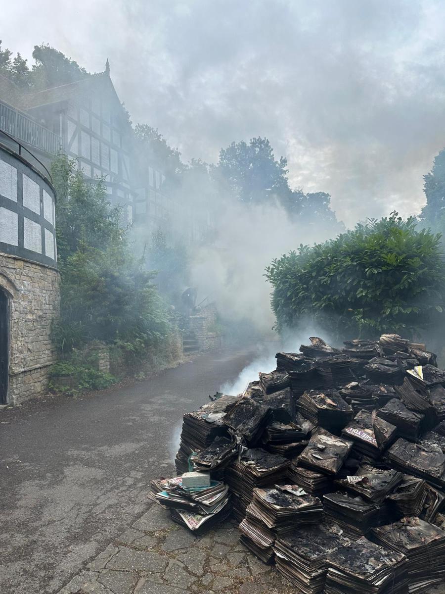 smokey newspaper pile