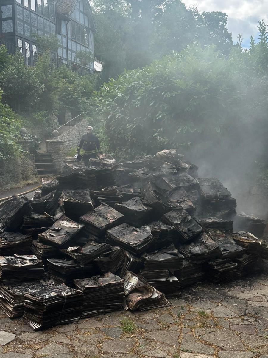 smokey newspaper pile